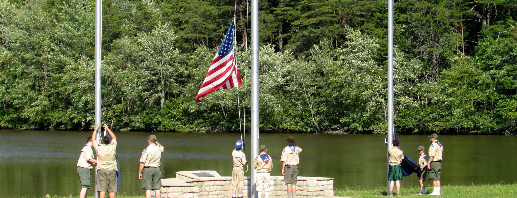 Scouts raise the flags at Camp McKee