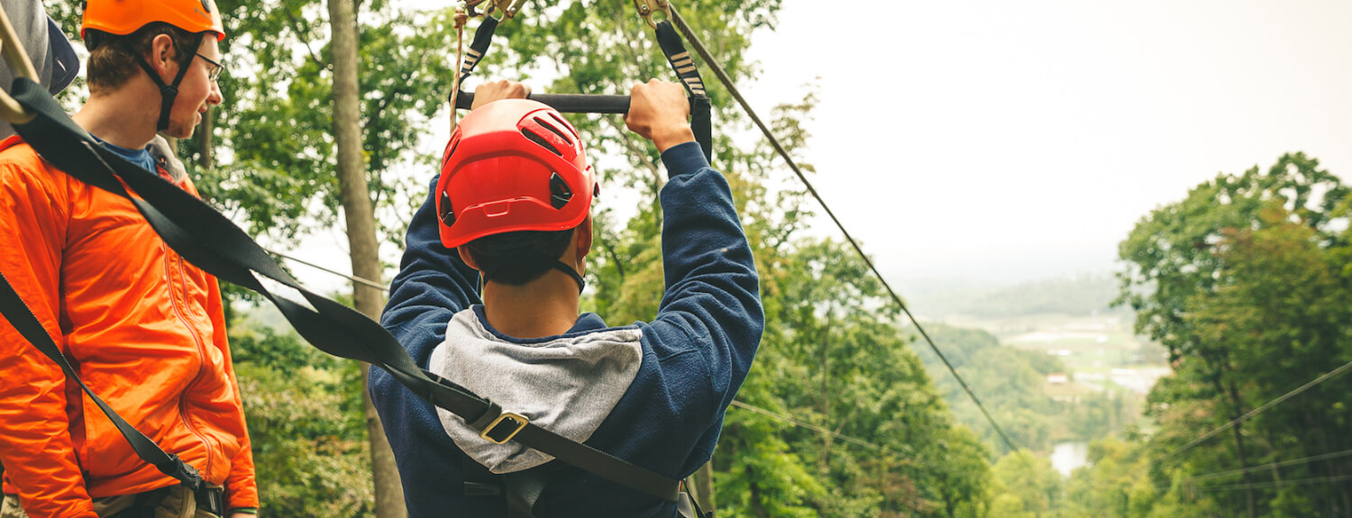 A Scout prepares to zip line