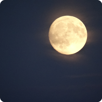 Full moon in the dark sky