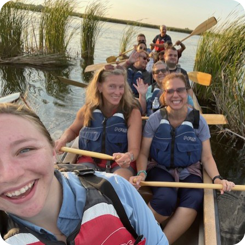 Large Group on Voyageur Canoe on a clear beautiful day